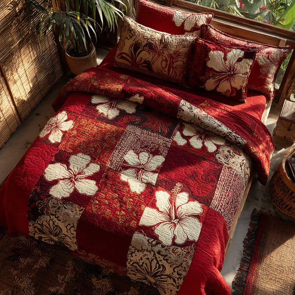 Hibiscus Garden quilted 3-piece bedding set on a made bed with two matching pillow shams