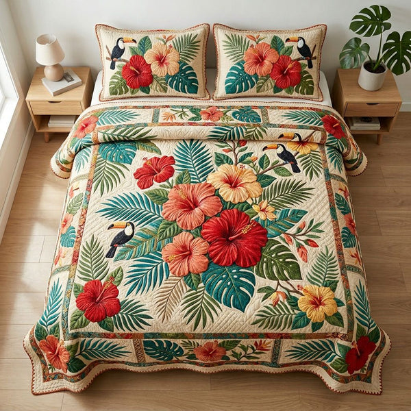Hibiscus Garden quilted 3-piece bedding set on a made bed with two matching pillow shams