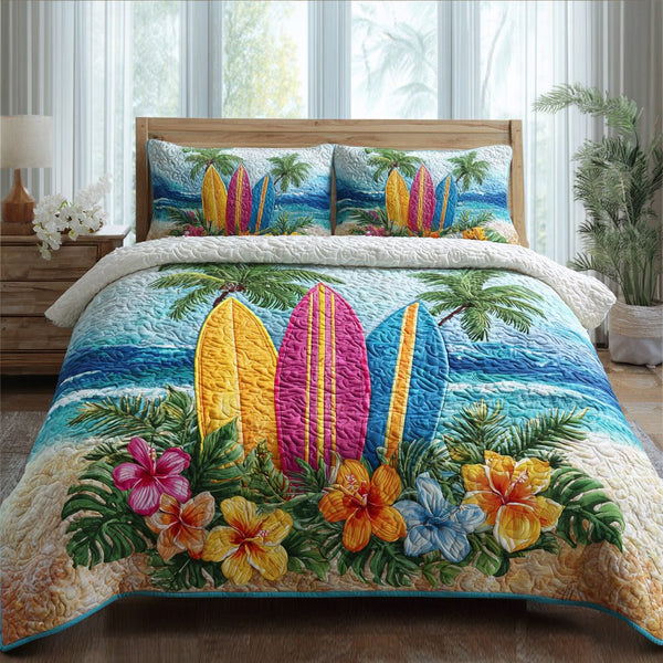 Hibiscus Haven quilted 3-piece bedding set on a made bed with two matching pillow shams