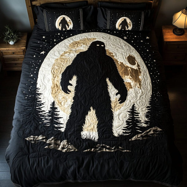 Hidden Footprint quilted 3-piece bedding set on a made bed with two matching pillow shams