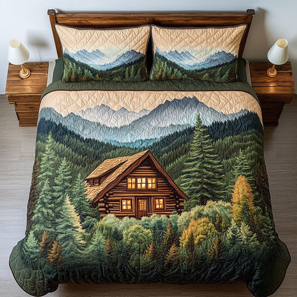 Hidden Mountain Lodge quilted 3-piece bedding set on a made bed with two matching pillow shams
