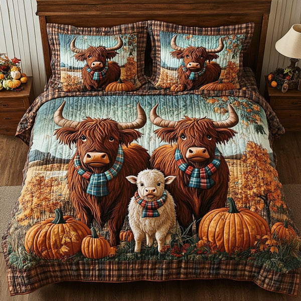 Highland Cow Harvest quilted 3-piece bedding set on a made bed with two matching pillow shams