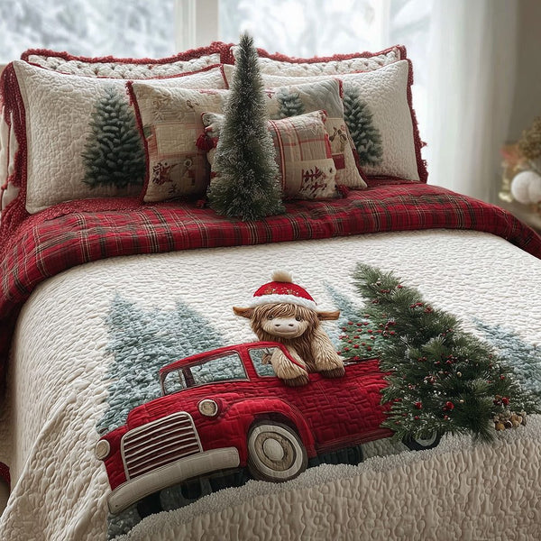Highland Cow Holiday Haul quilted 3-piece bedding set on a made bed in a winter-styled bedroom