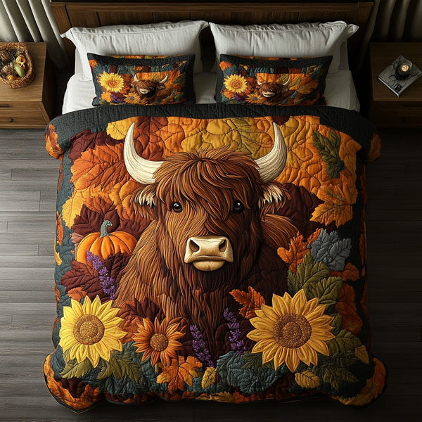 Highland Cow Valley quilted 3-piece bedding set on a made bed with two matching pillow shams