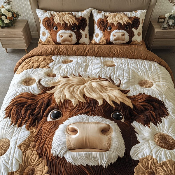 Highland Dreams quilted 3-piece bedding set on a made bed with two matching pillow shams