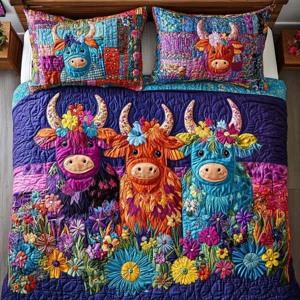 Highland Floral Bliss quilted 3-piece bedding set on a made bed with two matching pillow shams