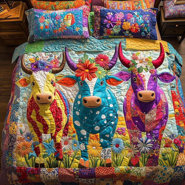 Highland Sunset Glow quilted 3-piece bedding set on a made bed with two matching pillow shams