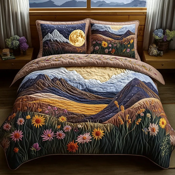 Highland Wildflower quilted 3-piece bedding set on a made bed with two matching pillow shams