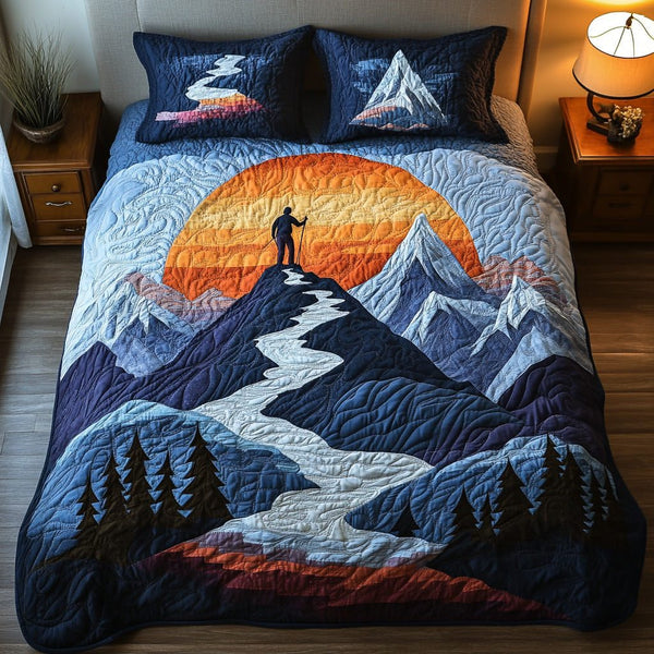 Highpoint Vista quilted 3-piece bedding set on a made bed with two matching pillow shams