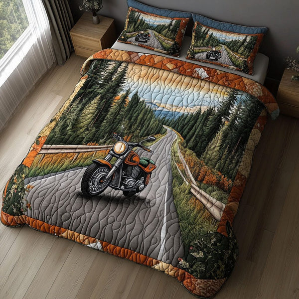 Highway Highlife quilted 3-piece bedding set on a made bed with two matching pillow shams