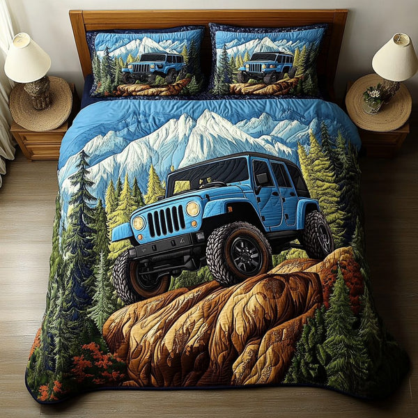 Hill Quest quilted 3-piece bedding set on a made bed with two matching pillow shams