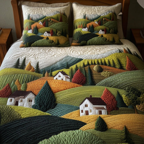 Hilltop Haven quilted 3-piece bedding set on a made bed with two matching pillow shams