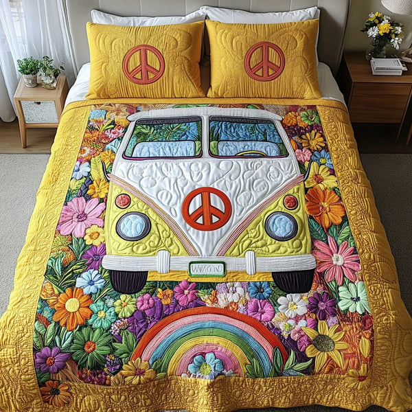 Hippie Dreams quilted 3-piece bedding set on a made bed with two matching pillow shams
