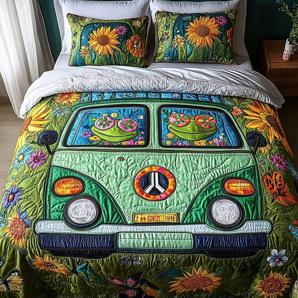 Hippie Frog Spirit quilted 3-piece bedding set on a made bed with two matching pillow shams