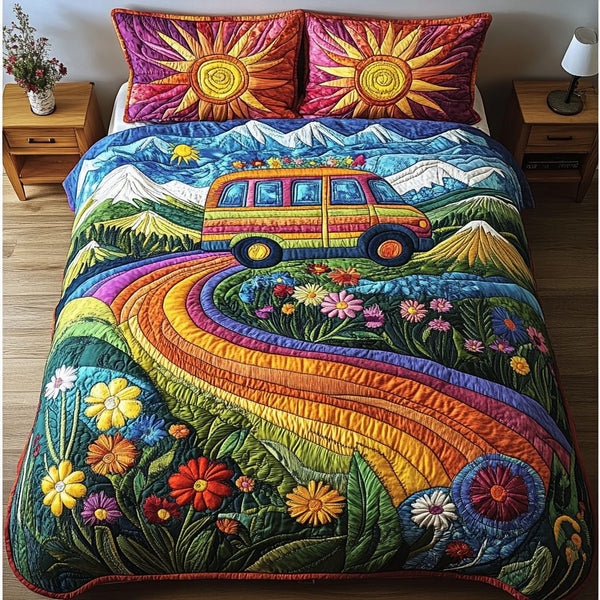 Hippie Trails quilted 3-piece bedding set on a made bed with two matching pillow shams