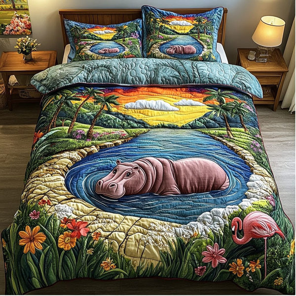 Hippo Harmony quilted 3-piece bedding set on a made bed with two matching pillow shams