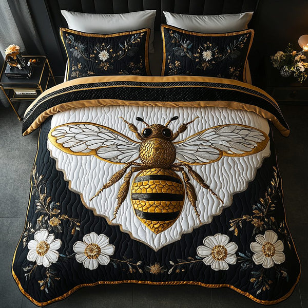 Hive Harmony quilted 3-piece bedding set on a made bed with two matching pillow shams