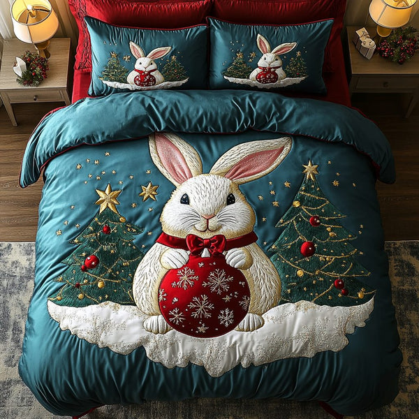Holiday Hare Magic quilted 3-piece bedding set on a made bed in a winter-styled bedroom