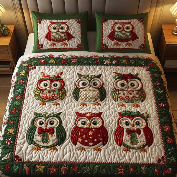 Holiday Hoots quilted 3-piece bedding set on a made bed in a winter-styled bedroom
