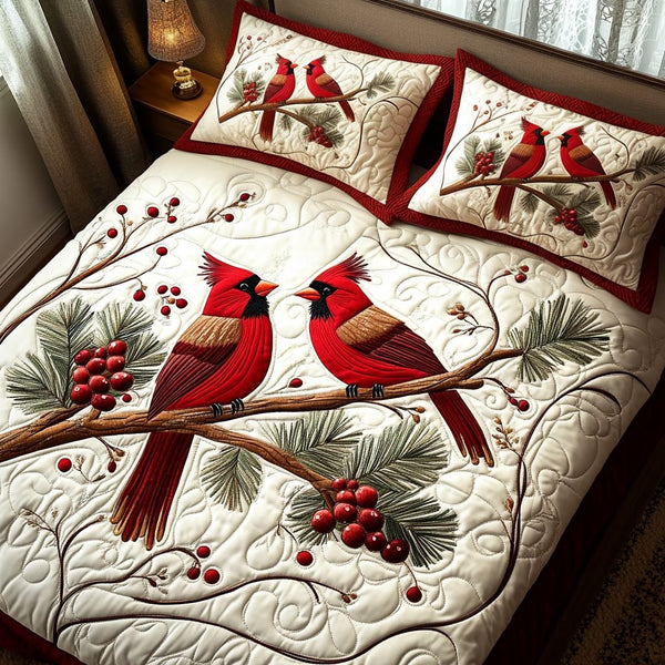 Holly Haven quilted 3-piece bedding set on a made bed with two matching pillow shams