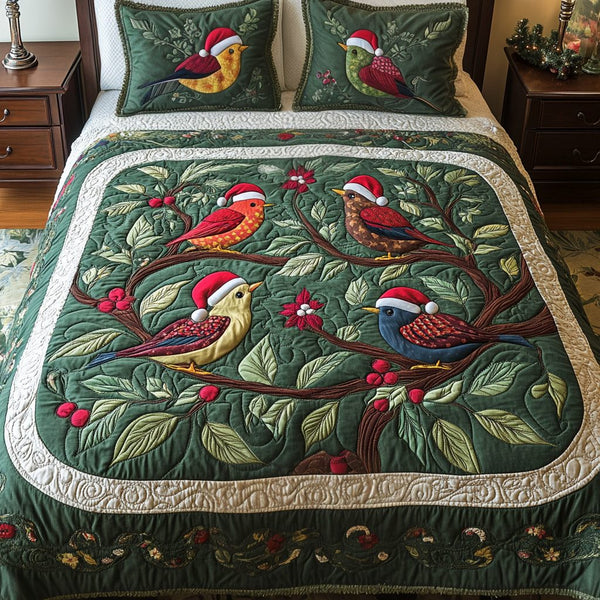 Holly Haven quilted 3-piece bedding set on a made bed with two matching pillow shams