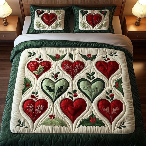 Holly Hearts quilted 3-piece bedding set on a made bed with two matching pillow shams