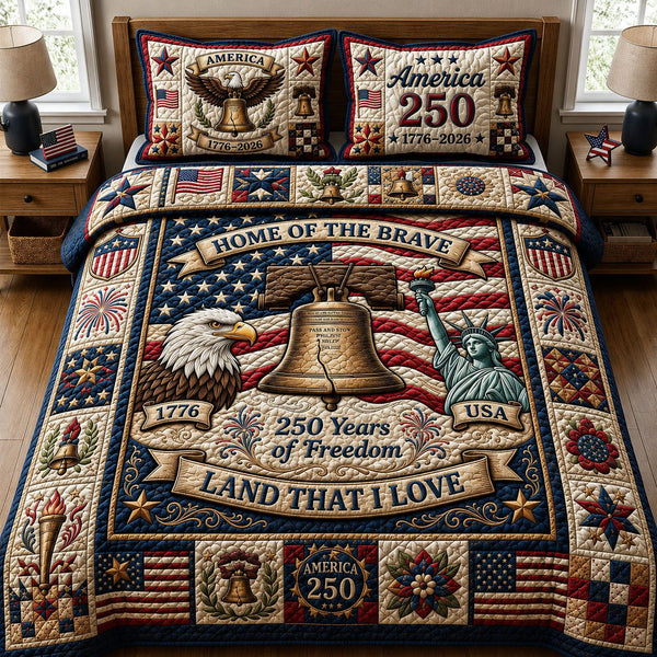 Home Of The Brave quilted 3-piece bedding set on a made bed with two matching pillow shams