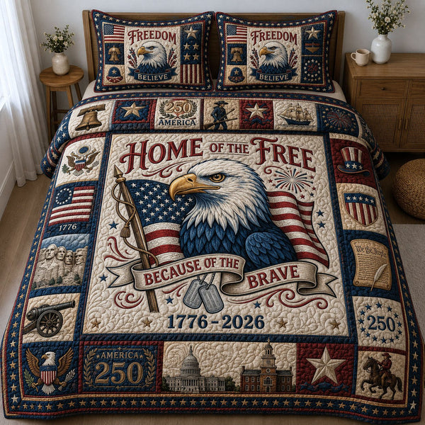Home Of The Free quilted 3-piece bedding set on a made bed with two matching pillow shams