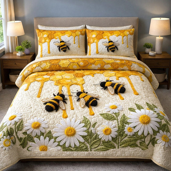 Honey Buzz quilted 3-piece bedding set on a made bed with two matching pillow shams