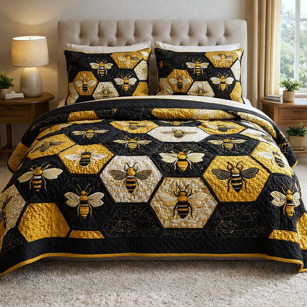 Honey Buzz quilted 3-piece bedding set on a made bed with two matching pillow shams