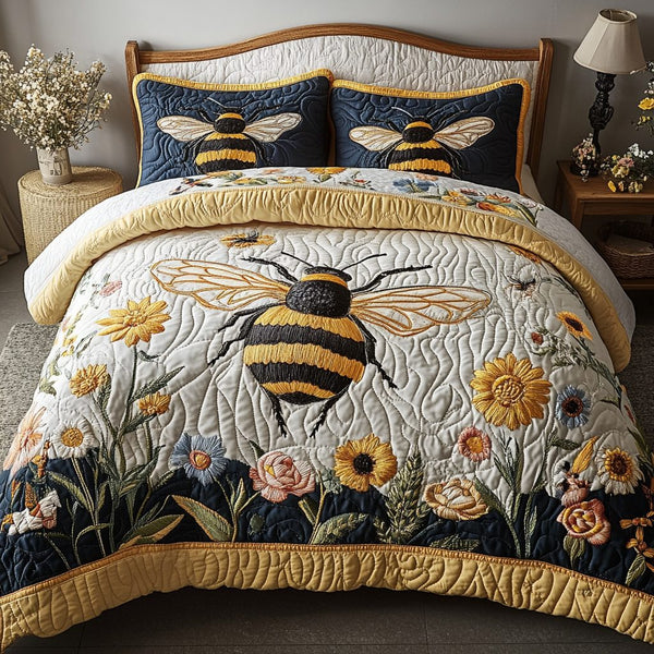Honey Buzz quilted 3-piece bedding set on a made bed with two matching pillow shams