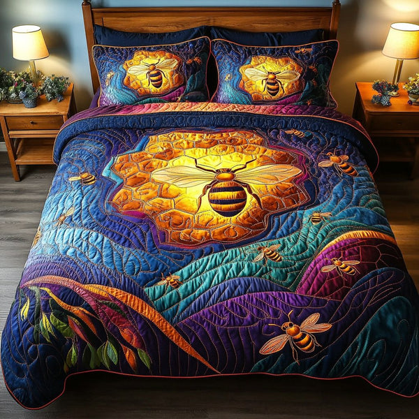 Honey Wings quilted 3-piece bedding set on a made bed with two matching pillow shams