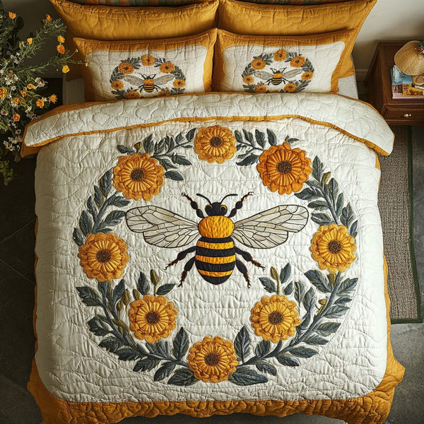 Honeybee Floral quilted 3-piece bedding set on a made bed with two matching pillow shams