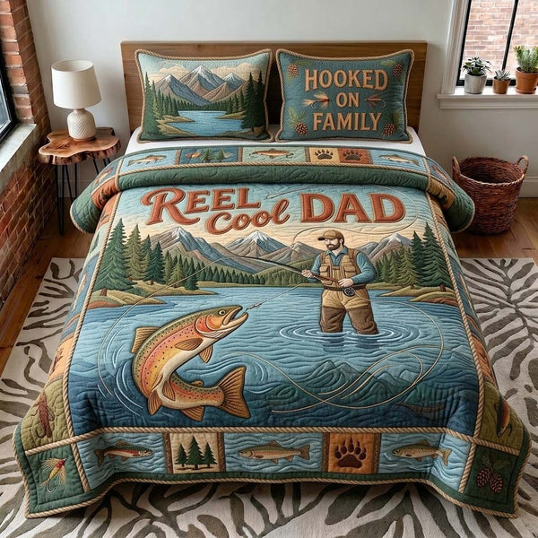 Hooked Family Dad quilted 3-piece bedding set on a made bed with two matching pillow shams