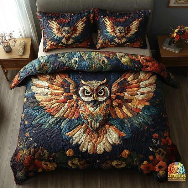Hoot and Harmony quilted 3-piece bedding set on a made bed with two matching pillow shams