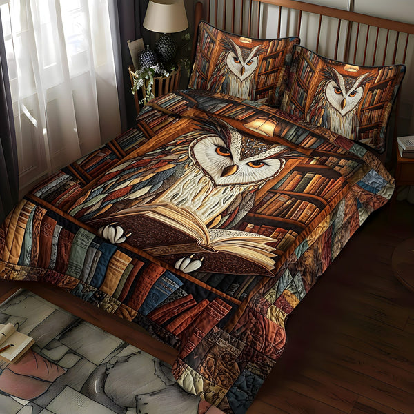 Hoot and Read quilted 3-piece bedding set on a made bed with two matching pillow shams