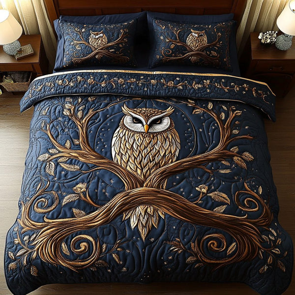 Hoot Haven quilted 3-piece bedding set on a made bed with two matching pillow shams