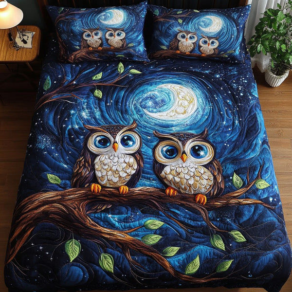 Hoots of Love quilted 3-piece bedding set on a made bed with two matching pillow shams