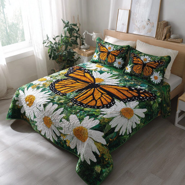 Hope Blooms quilted 3-piece bedding set on a made bed with two matching pillow shams