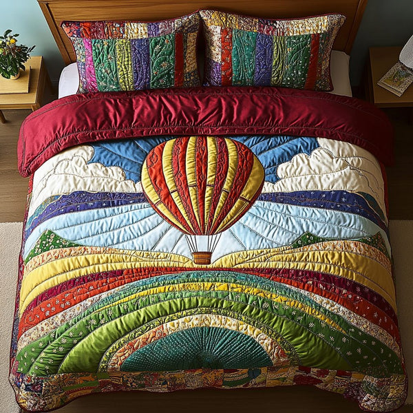 Horizon Lift quilted 3-piece bedding set on a made bed with two matching pillow shams