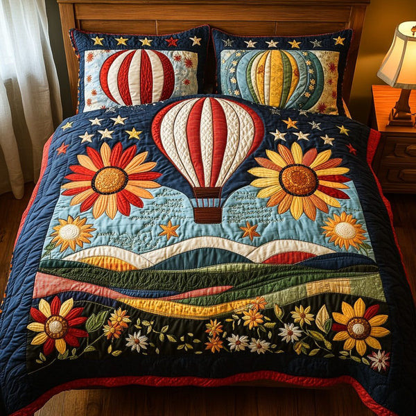 Hot Air Harvest quilted 3-piece bedding set on a made bed with two matching pillow shams