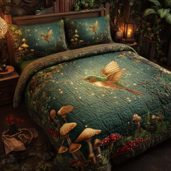 Hummingbird Heaven quilted 3-piece bedding set on a made bed in a softly lit bedroom