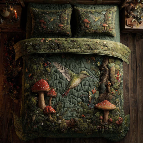 Hummingbird Heaven quilted 3-piece bedding set on a made bed in a softly lit bedroom