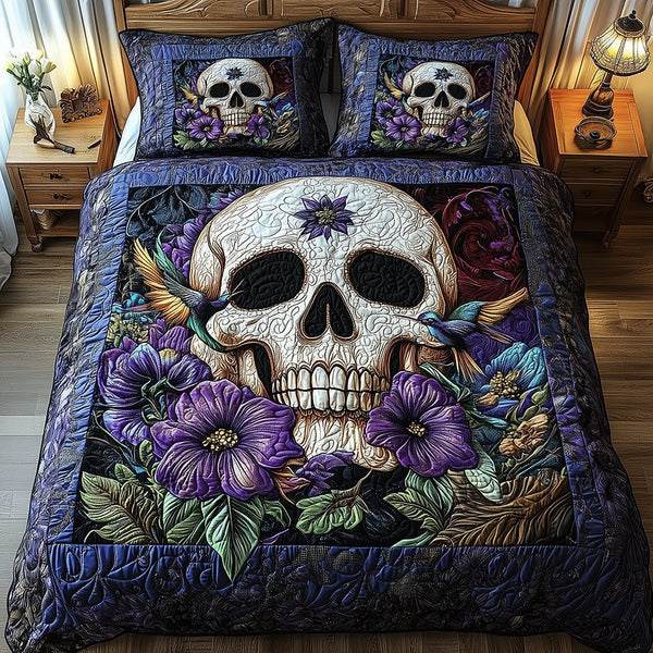 Hummingbird Skull quilted 3-piece bedding set on a made bed against a dark styled interior