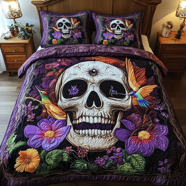 Hummingbird Skull quilted 3-piece bedding set on a made bed against a dark styled interior