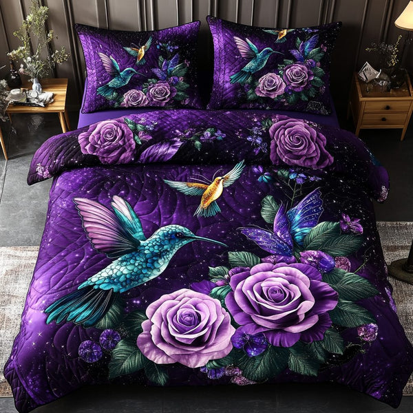 Hummingbird Spirit quilted 3-piece bedding set on a made bed with two matching pillow shams