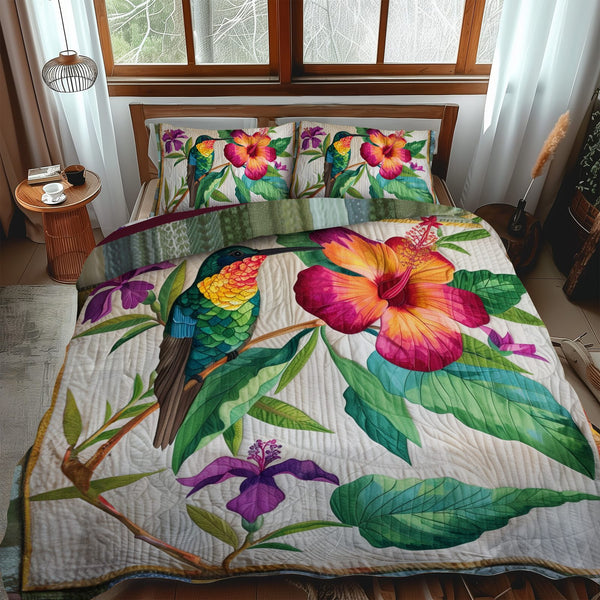 Hummingbird With Tropical Hibiscus quilted 3-piece bedding set on a made bed in a light coastal bedroom
