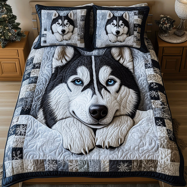 Husky Snowstorm quilted 3-piece bedding set on a made bed with two matching pillow shams
