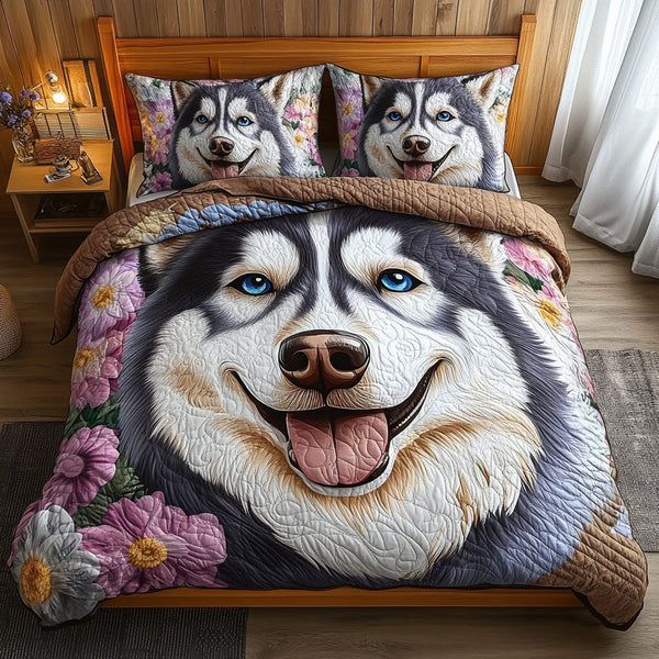 Husky Tracks quilted 3-piece bedding set on a made bed with two matching pillow shams