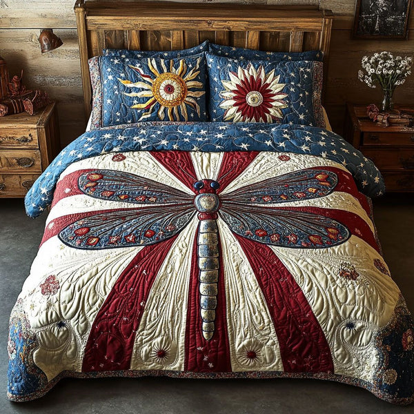 Independence Glide quilted 3-piece bedding set on a made bed in a warmly lit bedroom